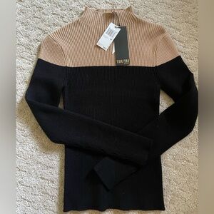Two tone tan black mock neck knitted long sleeve sweater